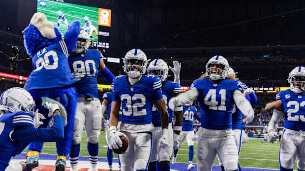 Dec 16, 2023; Indianapolis, Indiana, USA; Indianapolis Colts safety Julian Blackmon (32) celebrates his interception with teammates in the second half against the Pittsburgh Steelers at Lucas Oil Stadium.